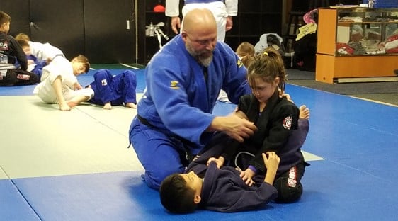 sensei teaching kids judo